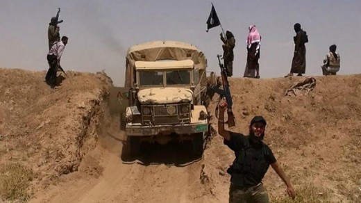 Gewapende strijders van ISIS bij de grens tussen Syrië en Irak Foto |  © AFP .