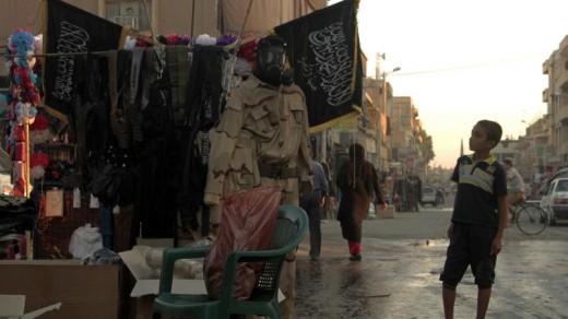 Een jongen op een markt in Raqqa, de hoofdstad van het IS-kalifaat | AFP .