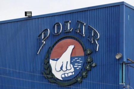 The corporate logo of Empresas Polar is seen at a facility of the company in Caracas July 30, 2015 | REUTERS/Carlos Garcia Rawlins
