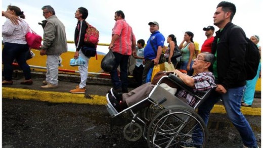 Tens of thousands of Venezuelans queued to cross the bridge into Colombia, and again on their return 