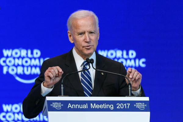 Outgoing US vice president Joe Biden addresses the assembly on the second day of the World Economic Forum, on January 18, 2017 in Davos. With the world's elite holding its breath until Donald Trump becomes the next US president, outgoing Vice-President Joe Biden addresses the World Economic Forum in Davos / AFP PHOTO / FABRICE COFFRINI politics diplomacy economy summit Horizontal
